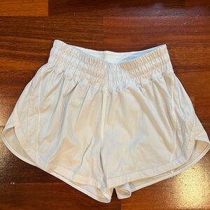 Women’s lululemon track that high rise lined short 3” size 6 white